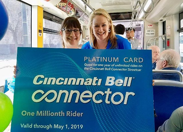 Friday the 13th was a lucky day for streetcar passenger Angie Jolevski when she was selected as the millionth ride prize package winner!
The Connector is expected to reach 1 Million rides in the next few days. To celebrate, one lucky rider was presented with a one-year Platinum “ride anytime” pass courtesy of @cincinnatibell!  Other awesome prizes came from our friends at: @broadwaycincy, @cincycyclones, @cincyshakes, @cincycac, @primecincy, @reds, @richterphillips_watches, @downtowncincy, @findlaymarket, @rhinegeist, @21chotels